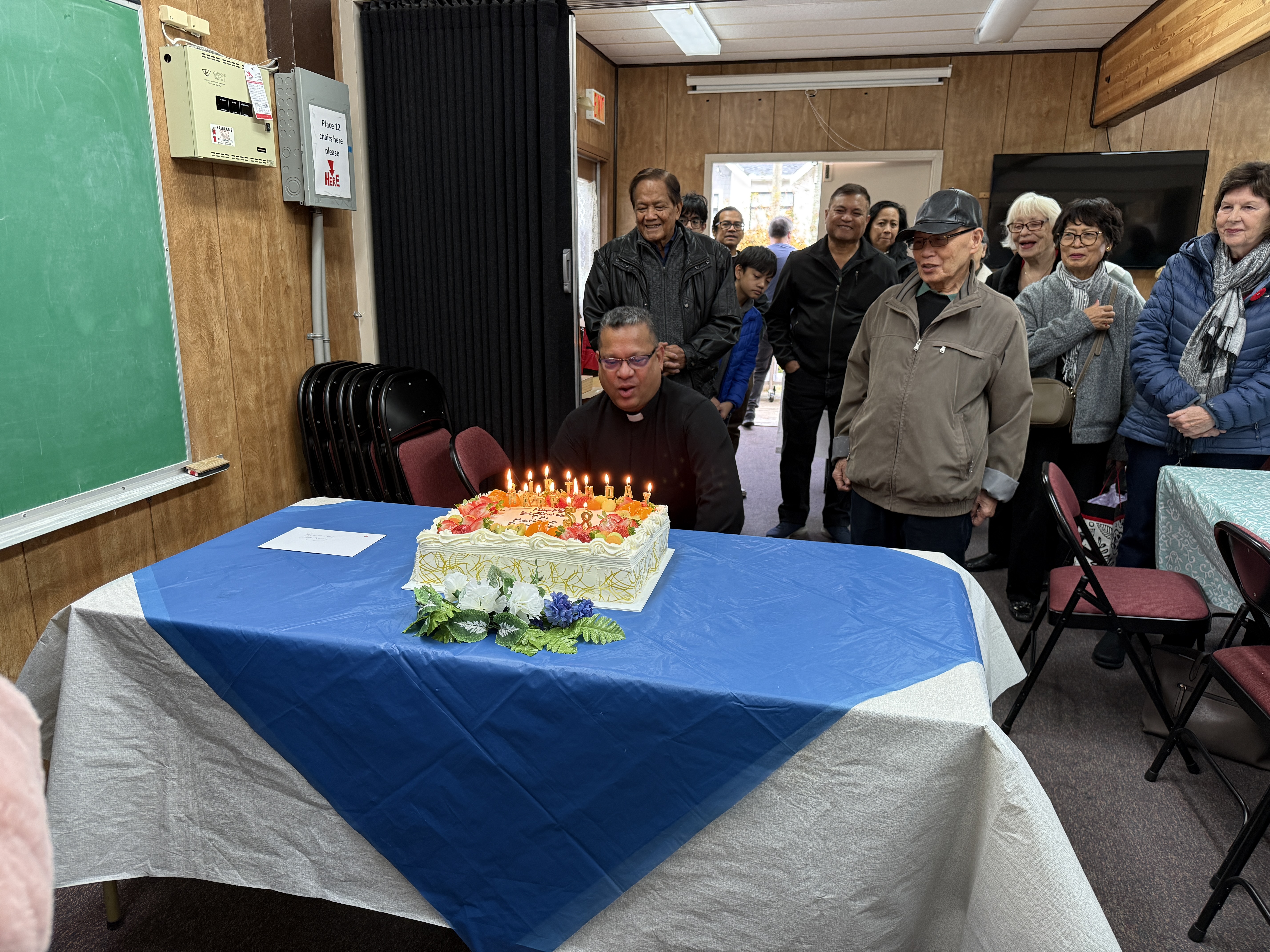Father Mariano smiling in the portable