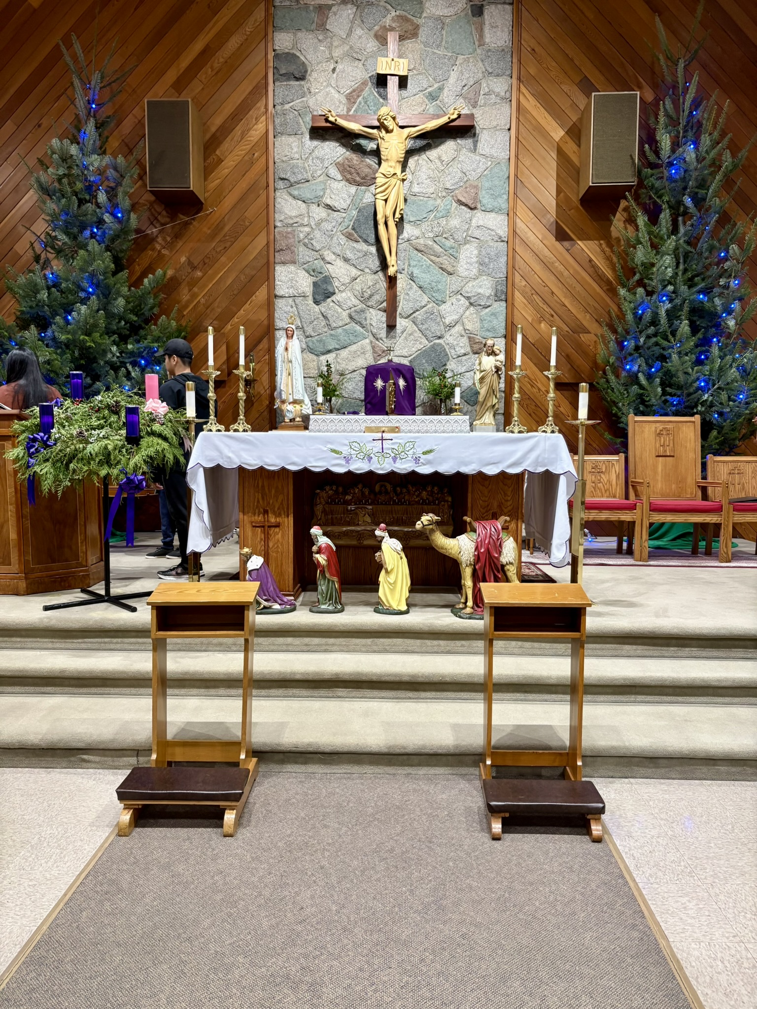 All trees raised — unloading the last one from the trailer after the job was done.