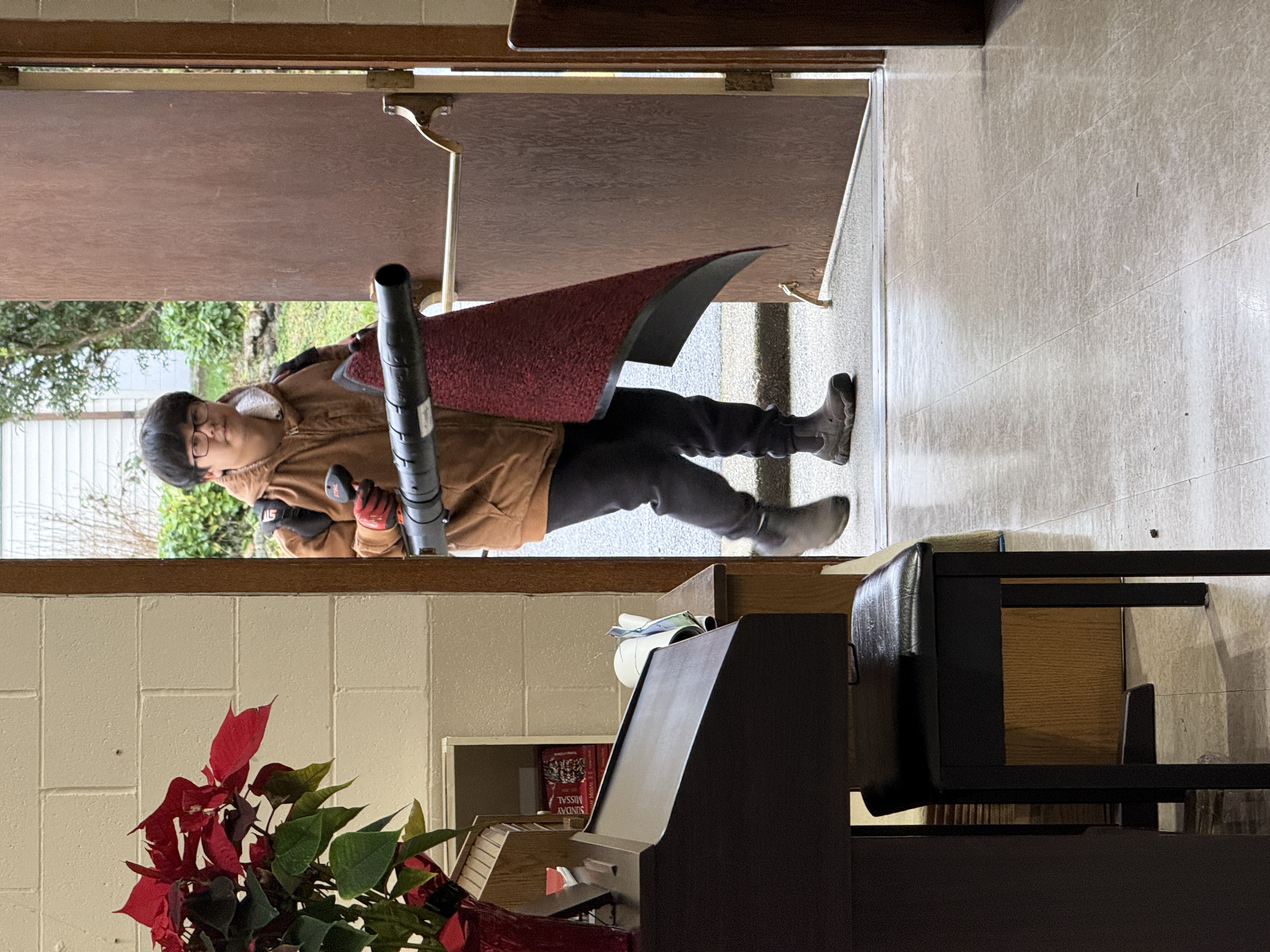 Team finishing the cleanup after Mass